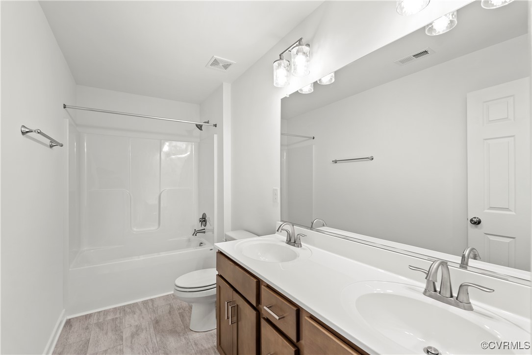 2-2 Old Telegraph Road Providence Forge, VA 23140 - Photo 14 of 19 a bathroom with a sink a toilet and shower