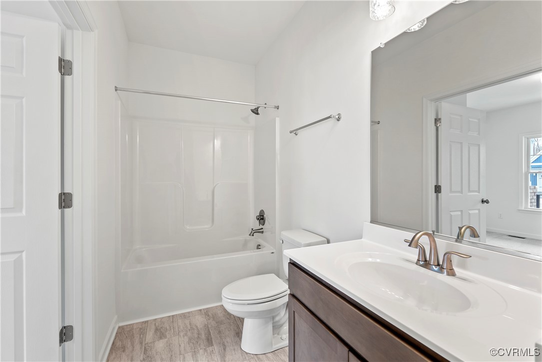 2-2 Old Telegraph Road Providence Forge, VA 23140 - Photo 18 of 19 a bathroom with a sink a toilet and shower