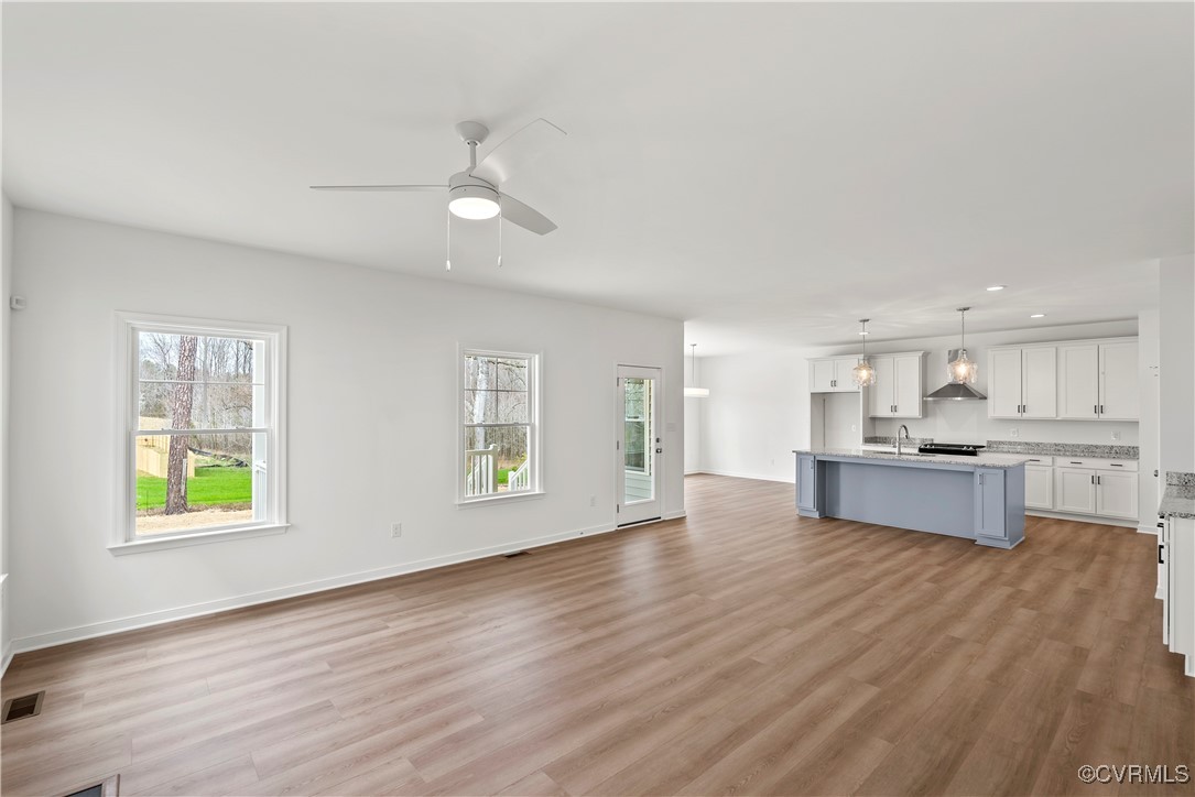 2-2 Old Telegraph Road Providence Forge, VA 23140 - Photo 3 of 19 a view of kitchen with kitchen island wooden floor and stainless steel appliances