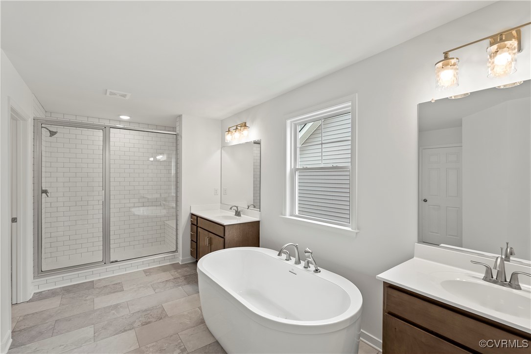 2-2 Old Telegraph Road Providence Forge, VA 23140 - Photo 7 of 19 a bathroom with a sink shower and a mirror