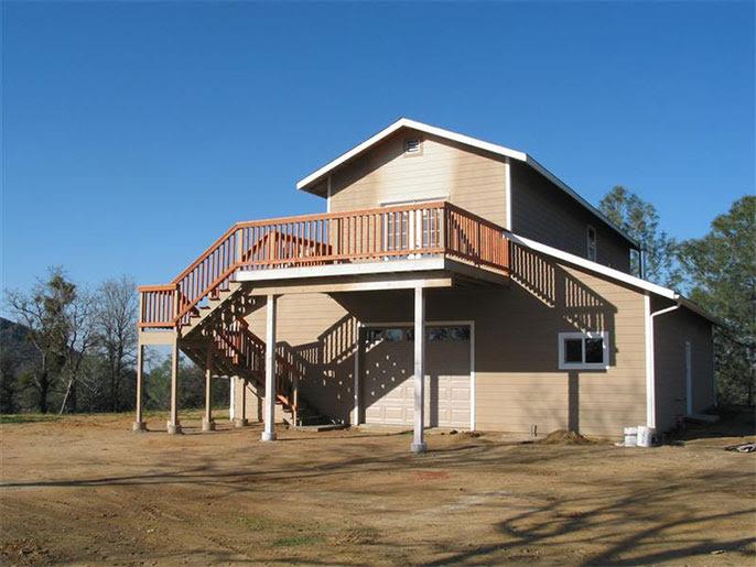 4195 Stumpfield Mountain Road Mariposa, CA 95338 - Photo 5 of 14 a front view of a house with a ocean view