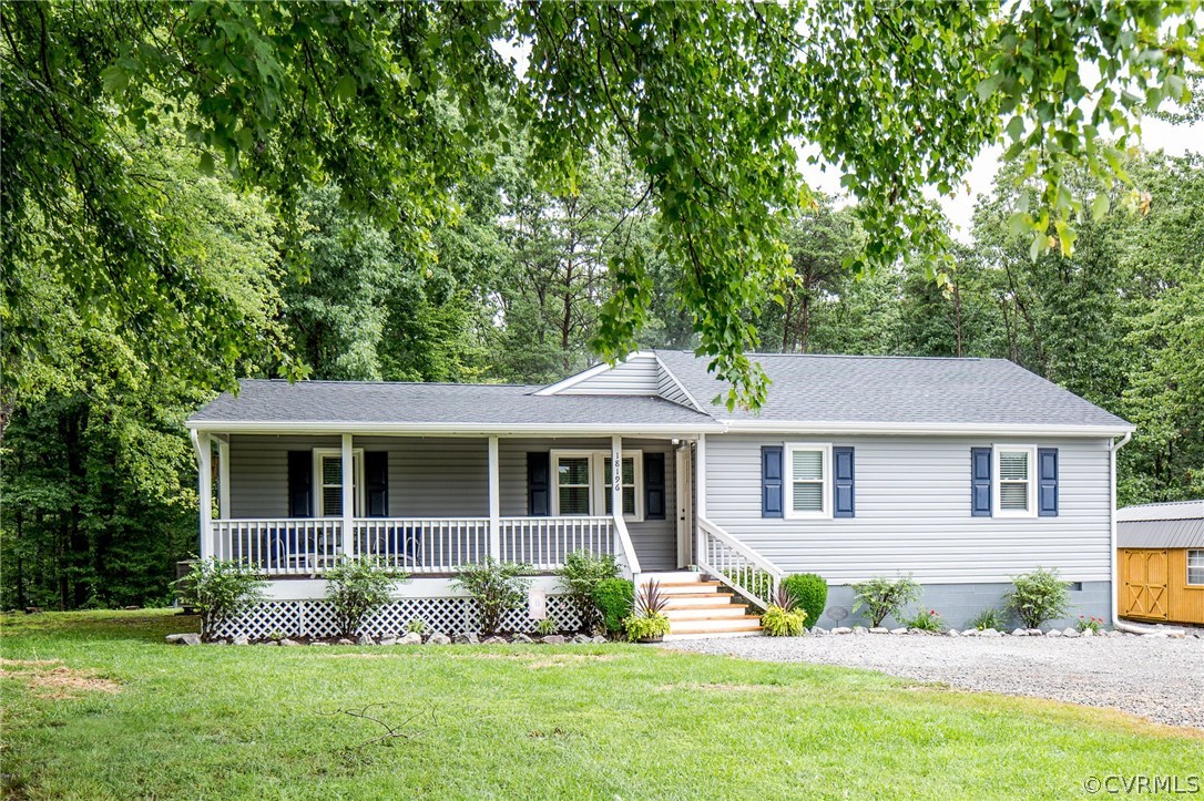 18196 Old Ridge Road Montpelier, VA 23192 - Photo 40 of 40 a front view of a house with garden and porch