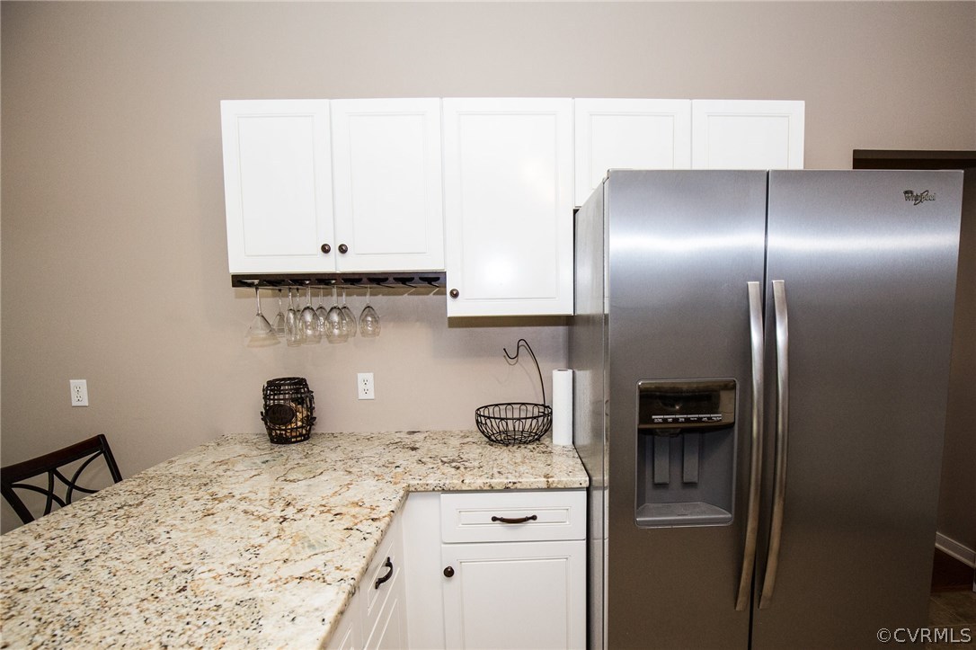 18196 Old Ridge Road Montpelier, VA 23192 - Photo 7 of 40 a kitchen with a refrigerator and a stove top oven