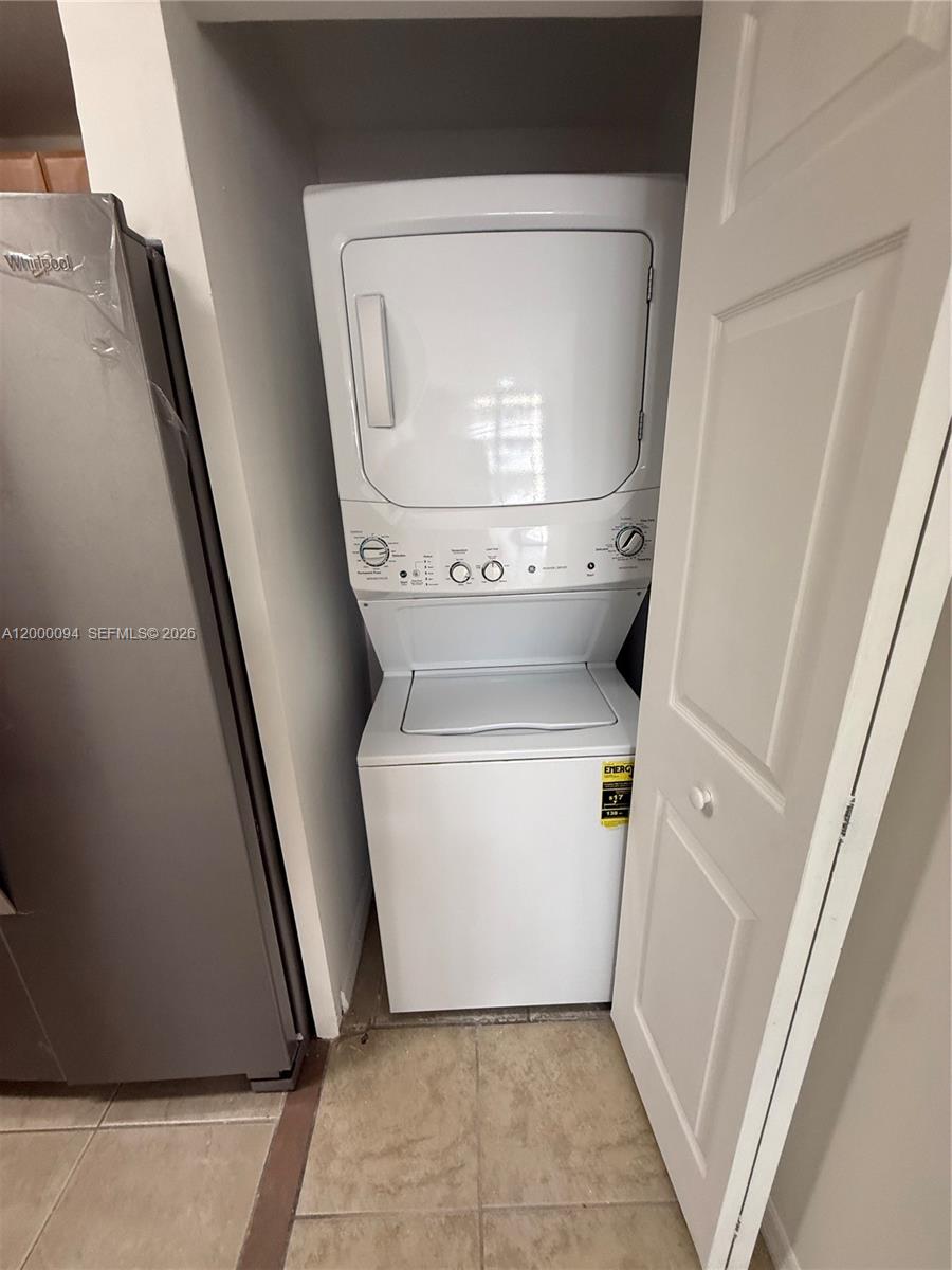 119 Southwest 6th Avenue, Unit 709 Miami, FL 33130 - Photo 4 of 18 a utility room with dryer and washer