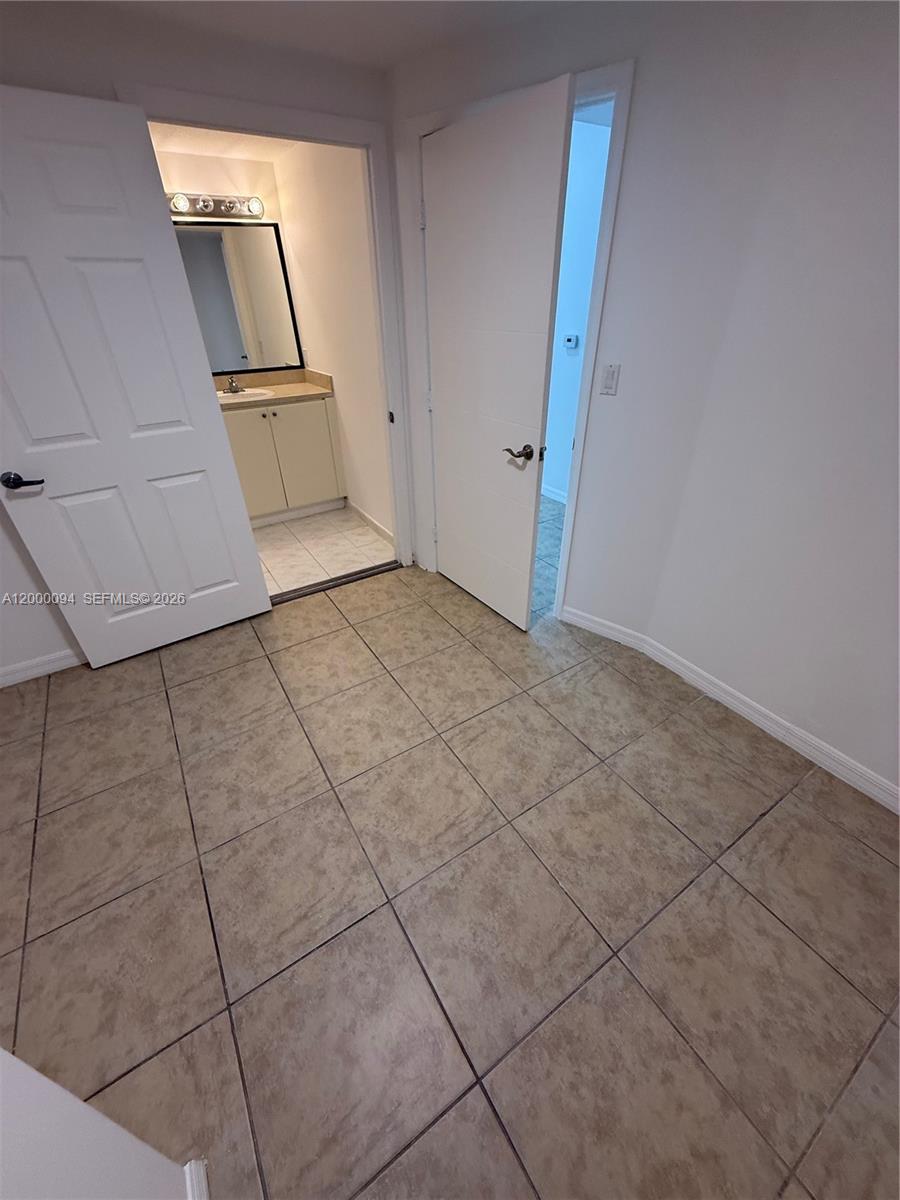 119 Southwest 6th Avenue, Unit 709 Miami, FL 33130 - Photo 7 of 18 a view of a storage & utility room in a house