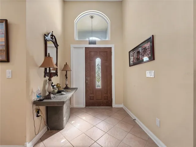 a view of a hallway with front door