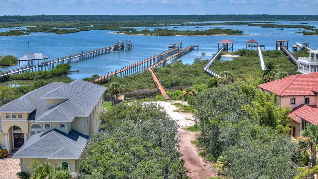 a view of a lake with a yard