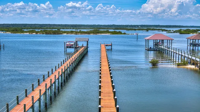 a view of swimming pool with a chairs