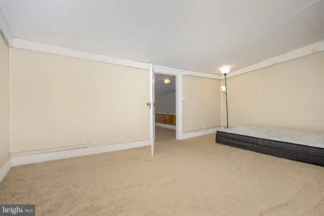 a room with a bed and a table