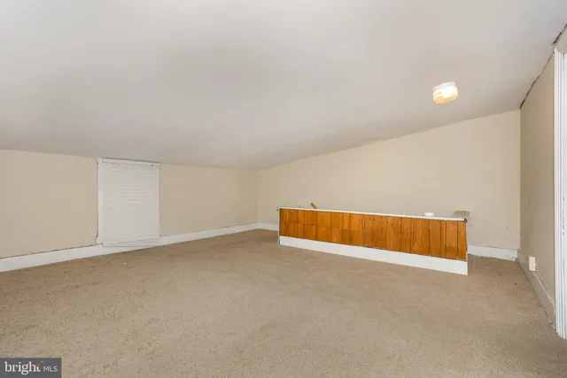 an empty room with an entryway