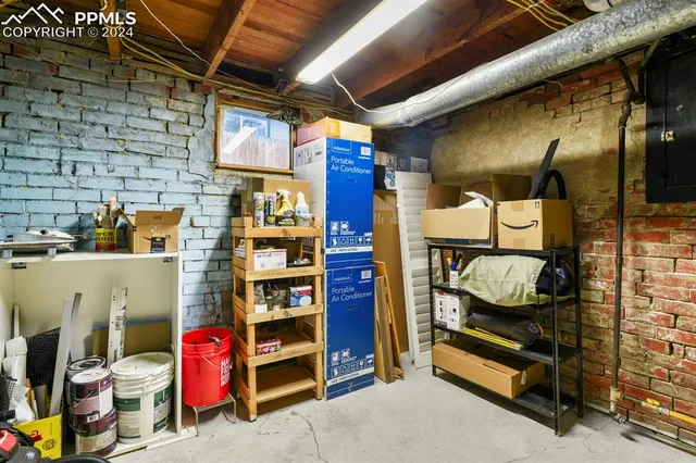 a room with storage and a table