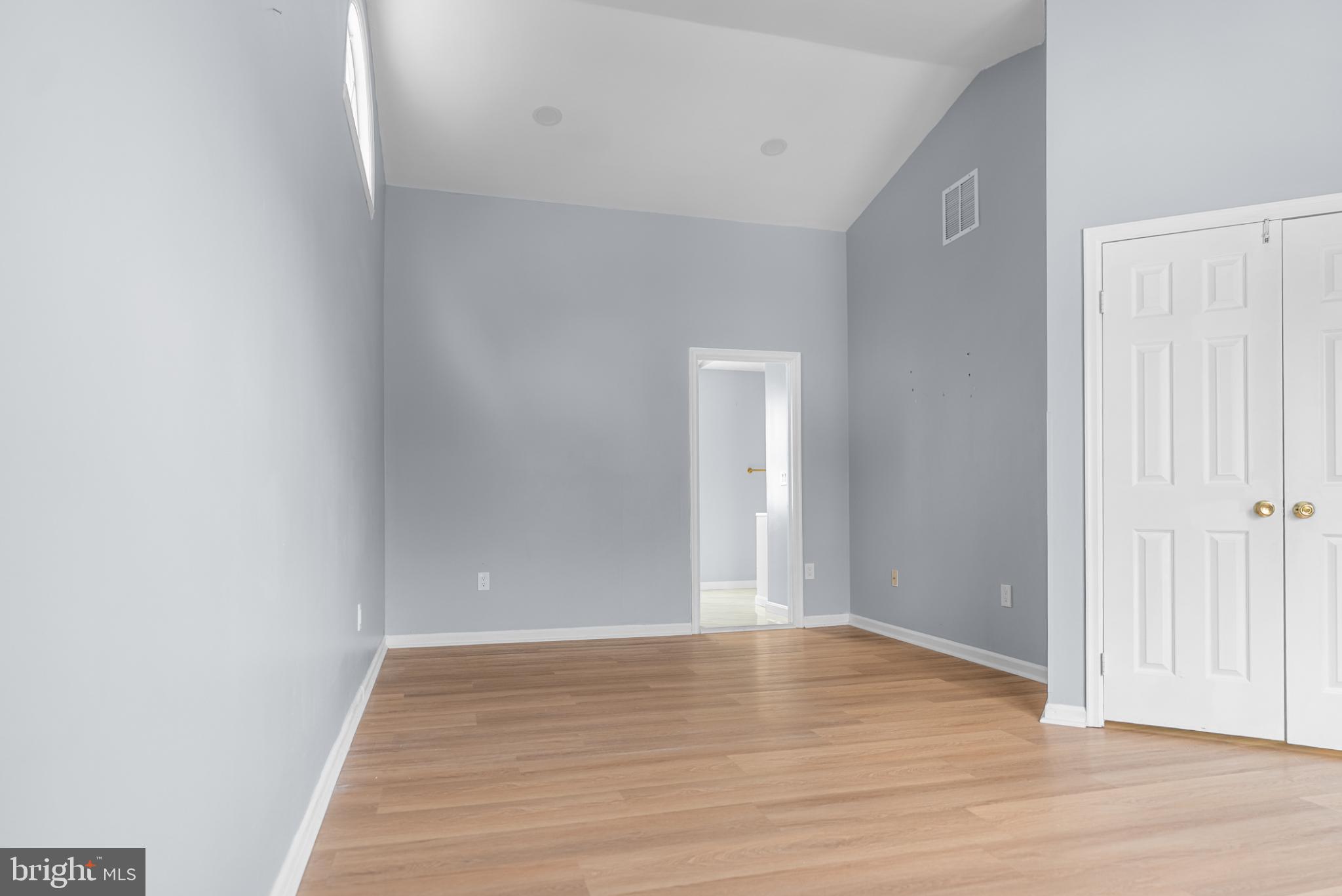 1137 Kingsbury Road Owings Mills, MD 21117 - Photo 14 of 24 a view of an empty room with wooden floor