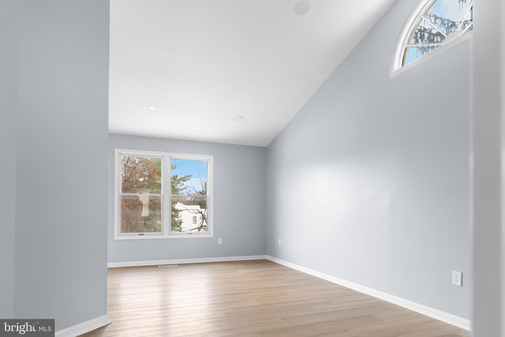 1137 Kingsbury Road Owings Mills, MD 21117 - Photo 15 of 24 an empty room with wooden floor and windows