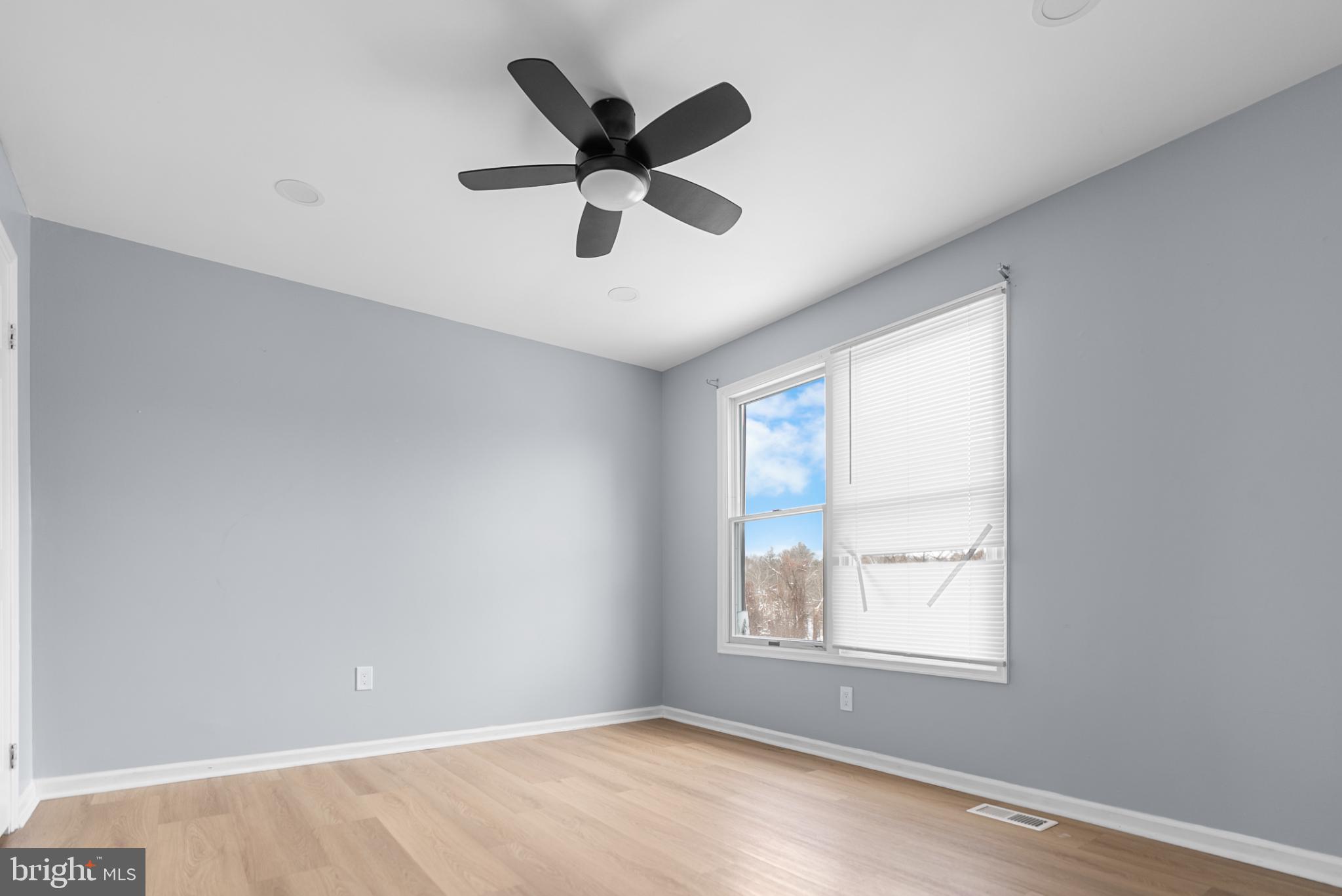 1137 Kingsbury Road Owings Mills, MD 21117 - Photo 18 of 24 a view of a big room with wooden floor and windows