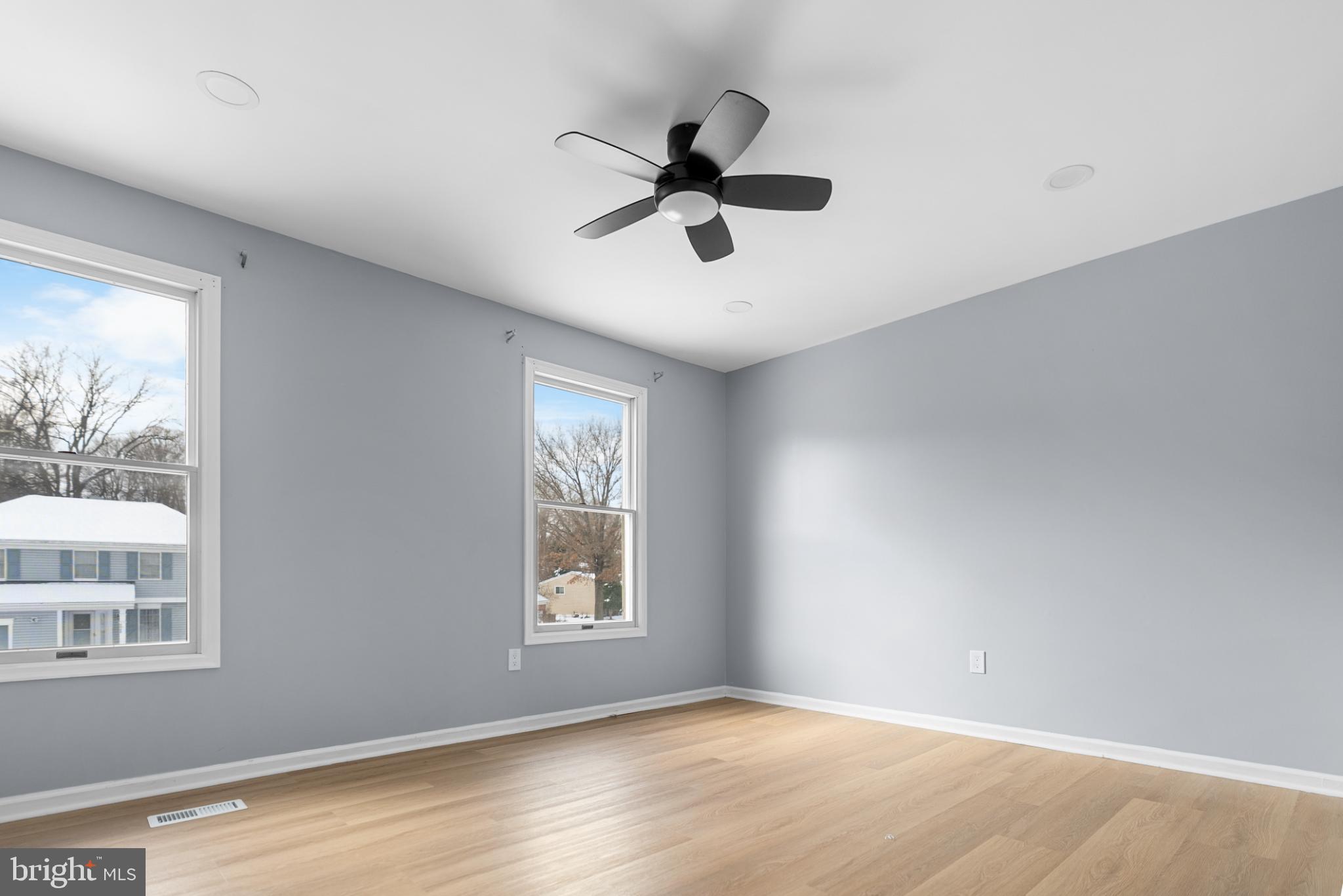 1137 Kingsbury Road Owings Mills, MD 21117 - Photo 19 of 24 a view of empty room with wooden floor and fan