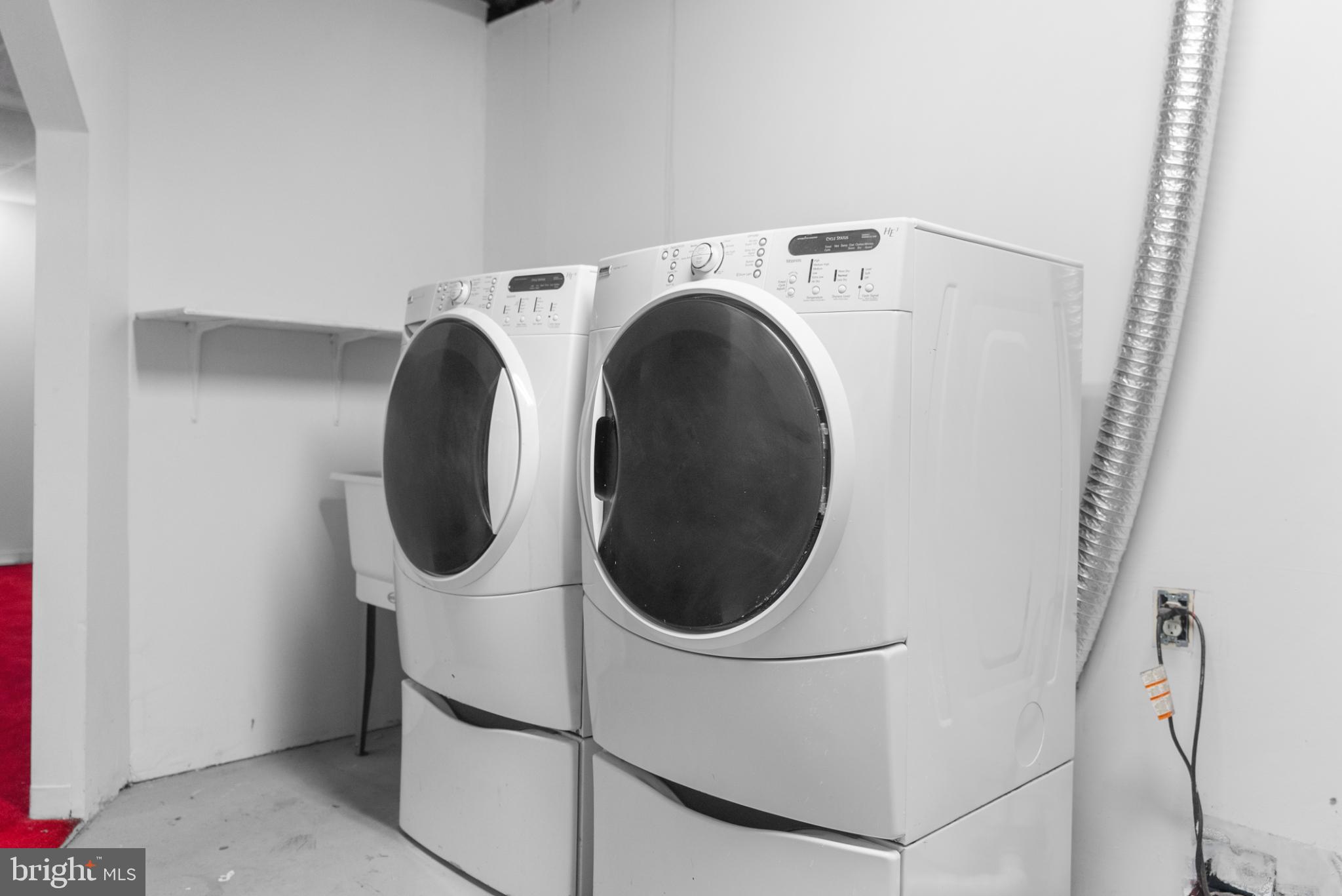 1137 Kingsbury Road Owings Mills, MD 21117 - Photo 23 of 24 a close up view of a washer and dryer