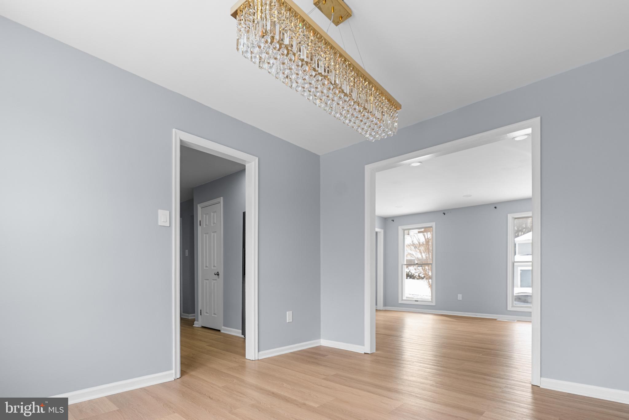 1137 Kingsbury Road Owings Mills, MD 21117 - Photo 8 of 24 a view of a hallway with wooden floor