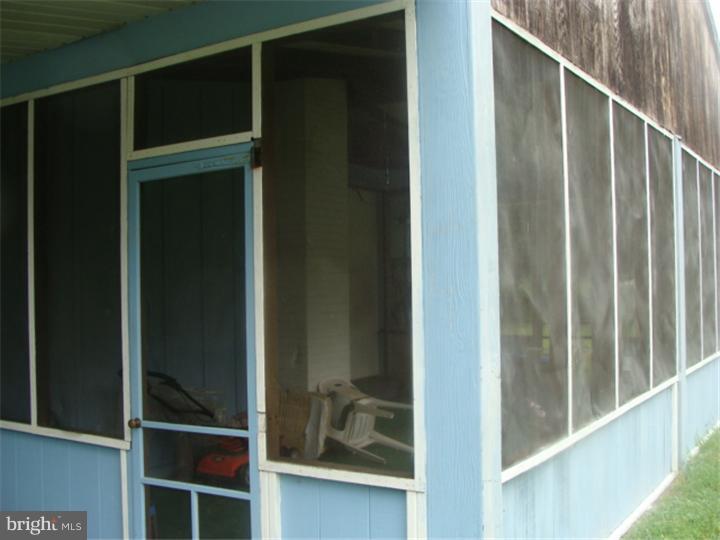 104 Valley Green Drive Aston, PA 19014 - Photo 4 of 20 a view of elevator with hallway