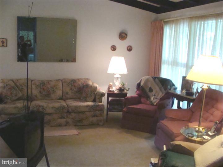 104 Valley Green Drive Aston, PA 19014 - Photo 6 of 20 a living room with furniture and a window