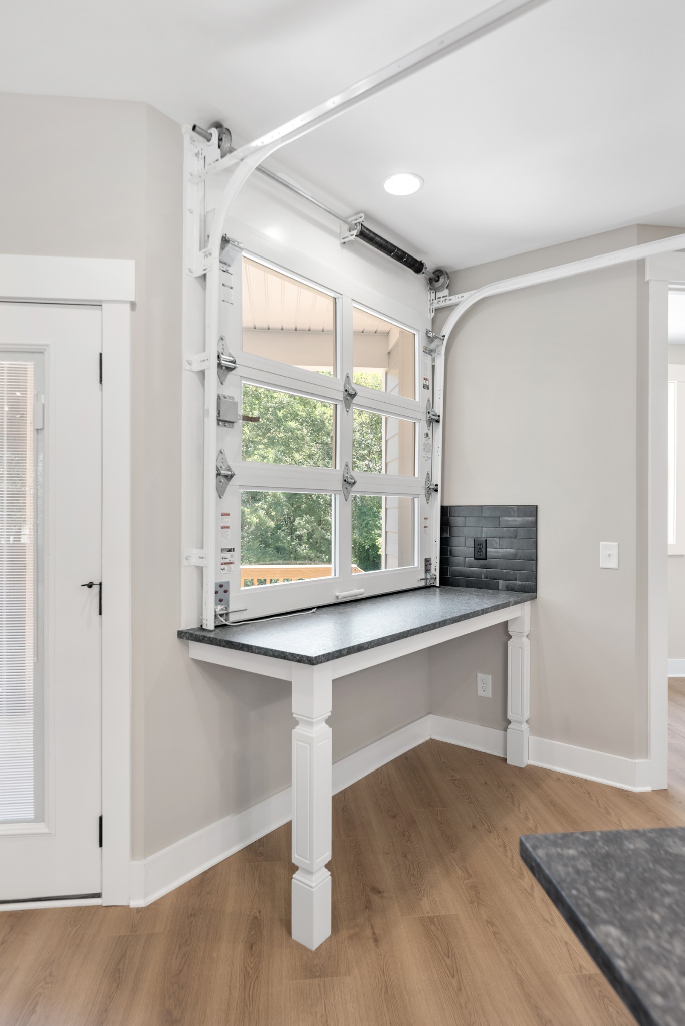 2033 Graceland Drive Goodlettsville, TN 37072 - Photo 12 of 40 a living room with a table and windows