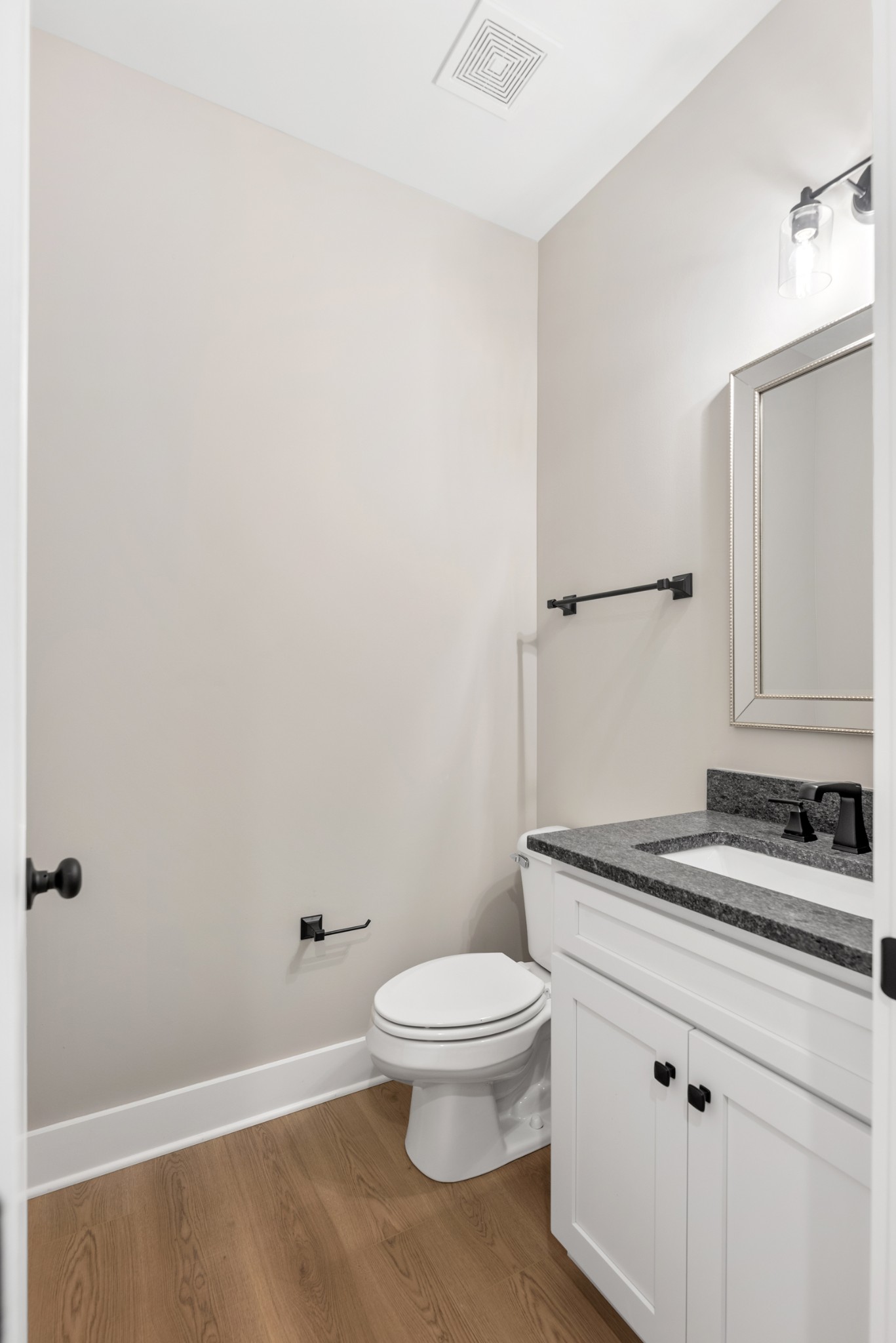 2033 Graceland Drive Goodlettsville, TN 37072 - Photo 25 of 40 a bathroom with a granite countertop toilet and a sink