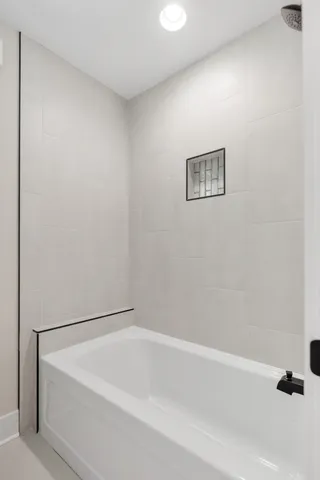 a bathroom with a bathtub