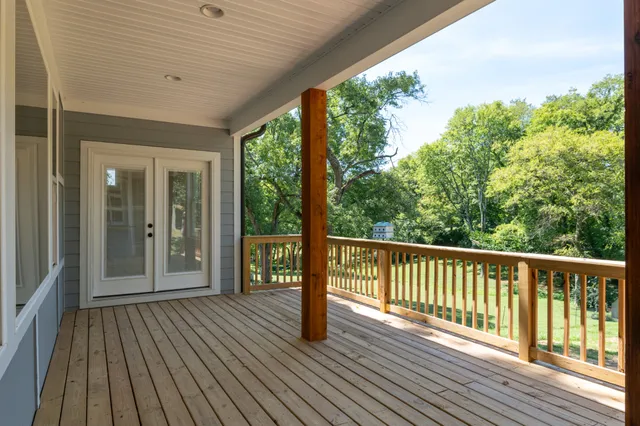 a view of front door and deck of the house