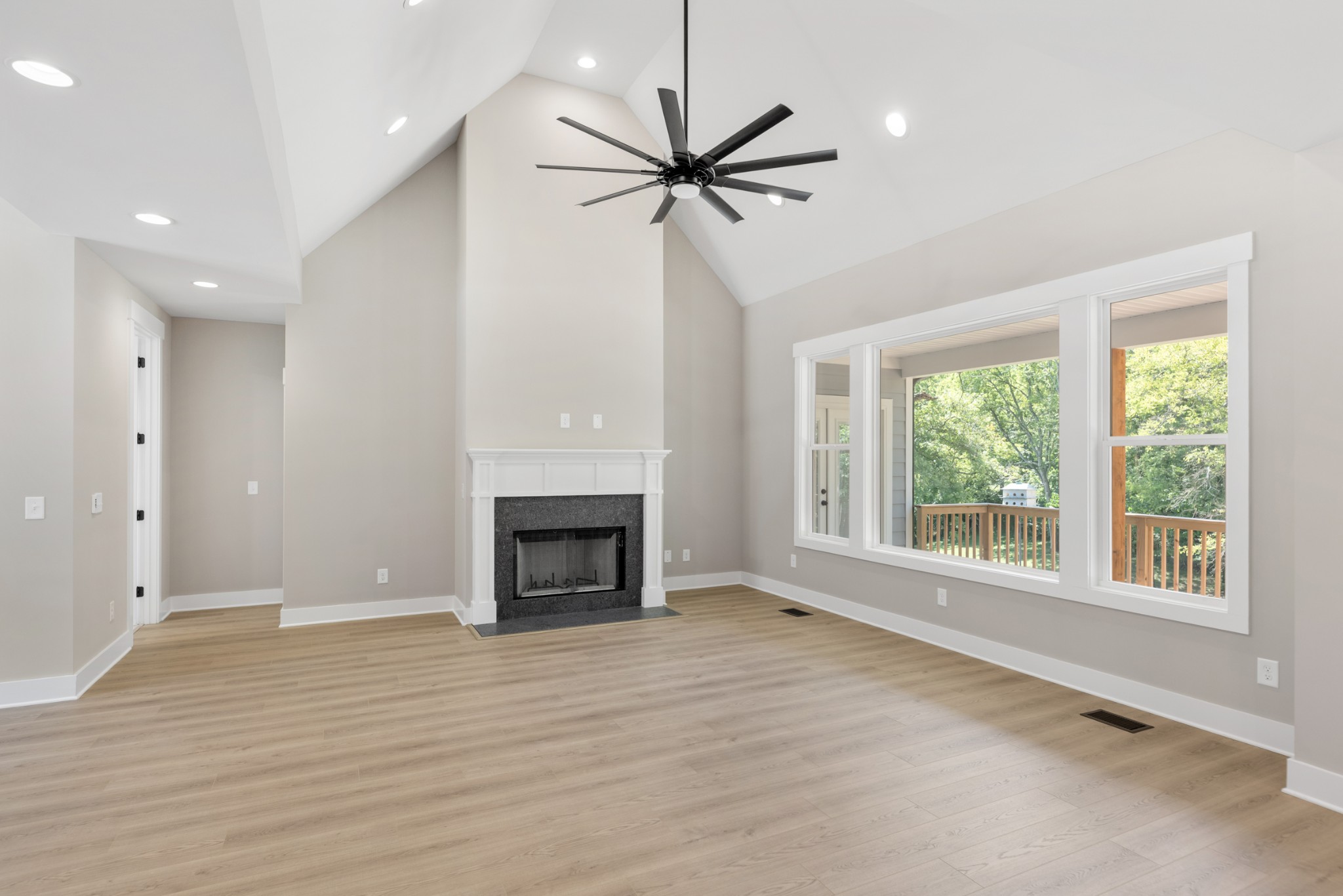 2033 Graceland Drive Goodlettsville, TN 37072 - Photo 4 of 40 a view of livingroom window fireplace and wooden floor