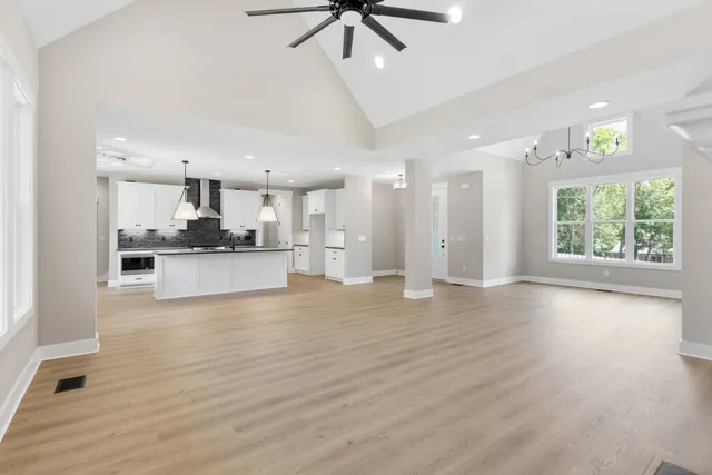 a view of a kitchen with a sink and a window