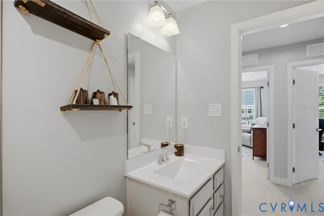 4120 Jefferson Rdg Drive Midlothian, VA 23112 - Photo 14 of 19 Vanity with an integrated rectangular sink and whi