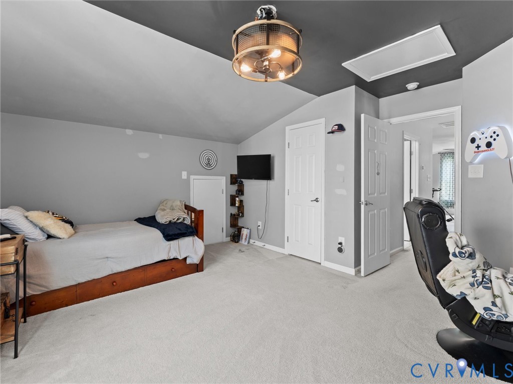 7434 South Franklins Way Quinton, VA 23141 - Photo 19 of 31 Spacious room featuring vaulted ceilings, light gr