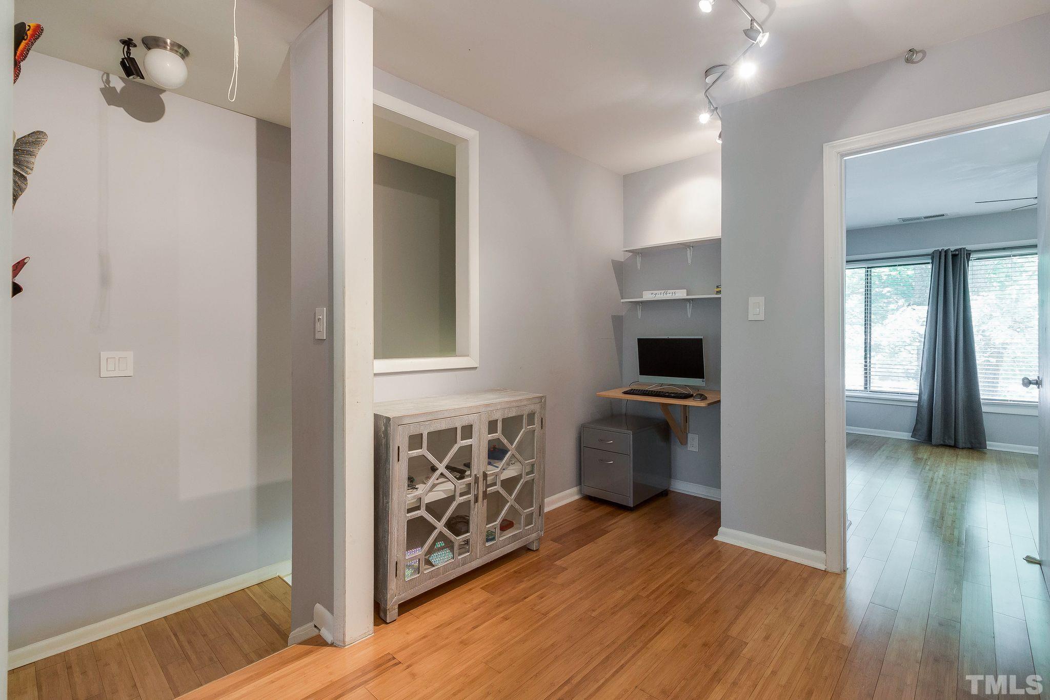 1770 Quail Ridge Road Raleigh, NC 27609 - Photo 15 of 26 a kitchen with stainless steel appliances a stove top oven and a refrigerator