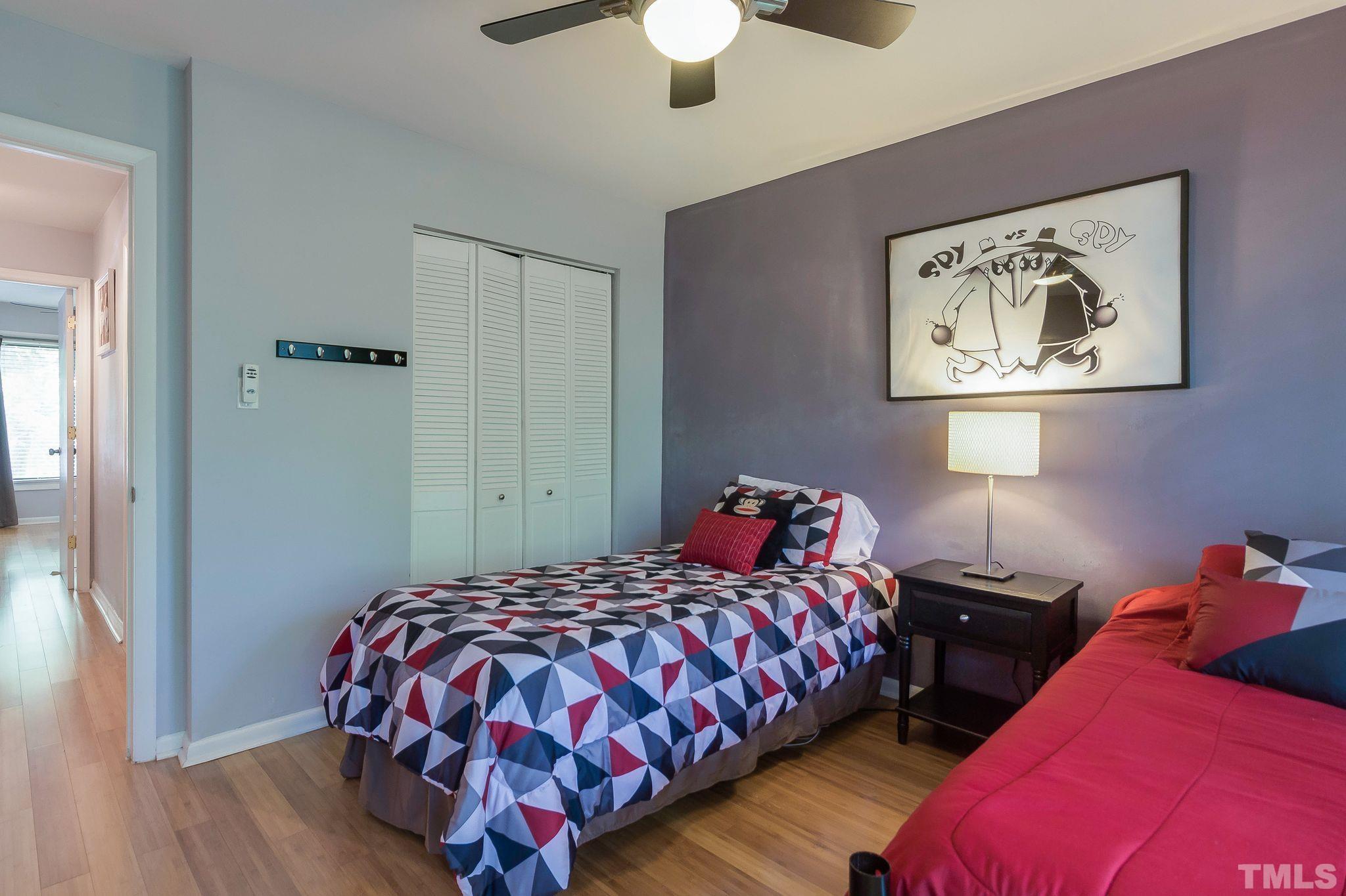 1770 Quail Ridge Road Raleigh, NC 27609 - Photo 22 of 26 a bedroom with bed and a window