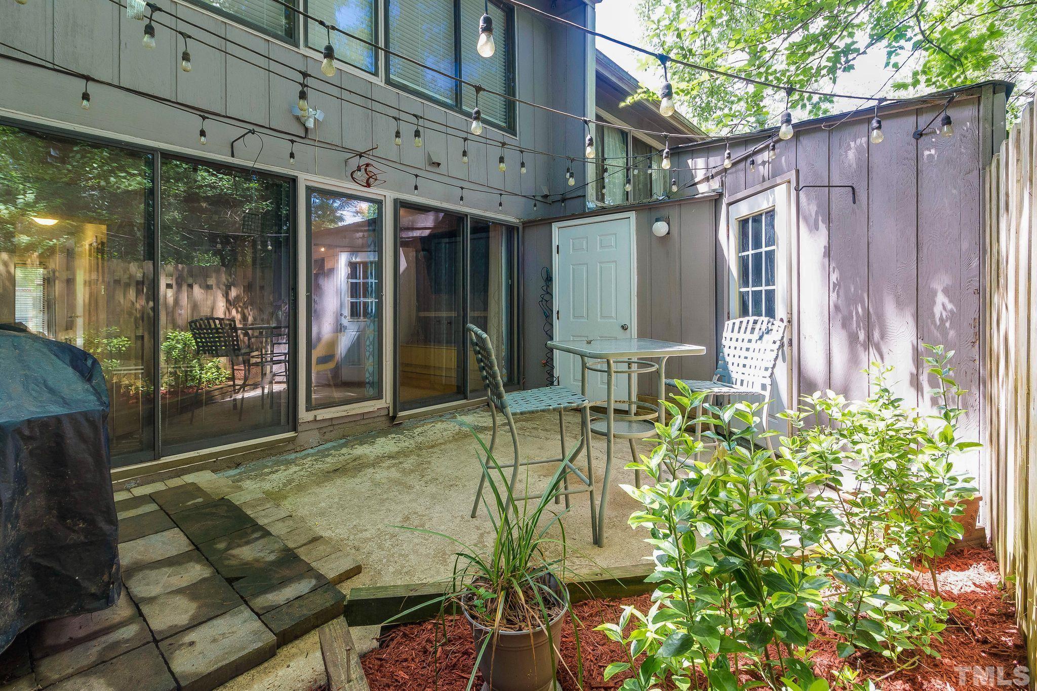 1770 Quail Ridge Road Raleigh, NC 27609 - Photo 25 of 26 a view of a chairs and table in the patio