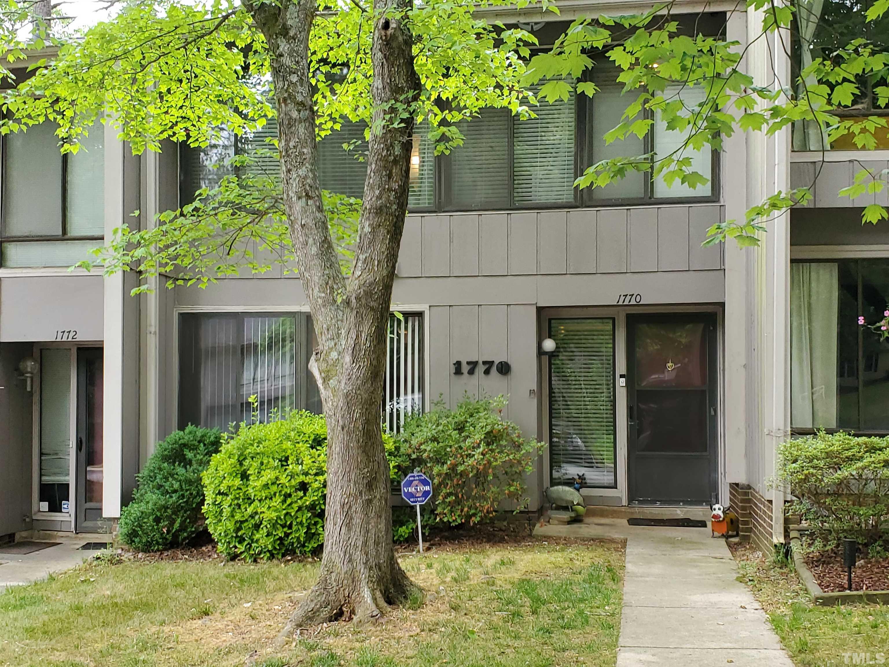 1770 Quail Ridge Road Raleigh, NC 27609 - Photo 3 of 26 a view of a potted plants in front of a house