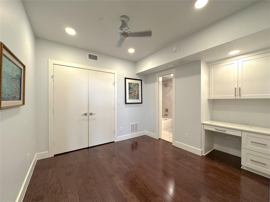 5200 Keller Springs Road, Unit 637 Dallas, TX 75248 - Photo 12 of 37 a view of empty room with wooden floor