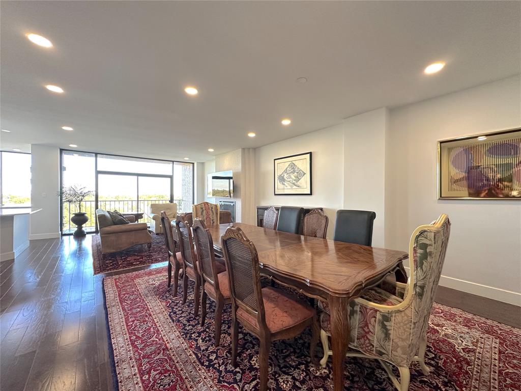 5200 Keller Springs Road, Unit 637 Dallas, TX 75248 - Photo 2 of 37 a view of a dining room with furniture window and wooden floor
