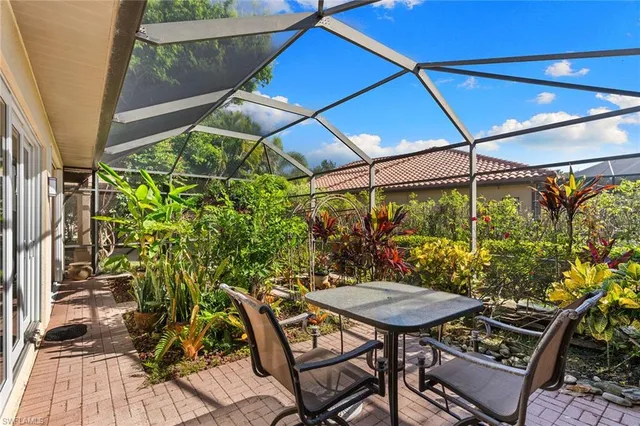 a view of a outdoor sitting area with furniture