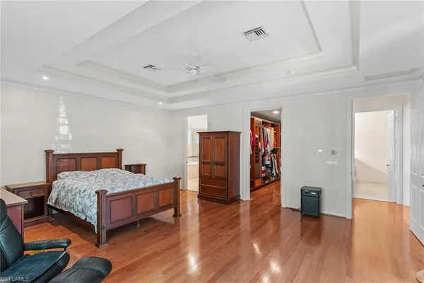 a view of entrance with wooden floor and a window