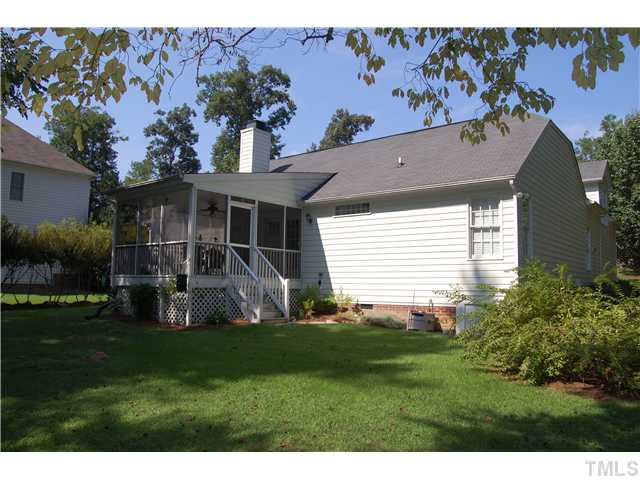10713 Durant Road Raleigh, NC 27615 - Photo 12 of 12 a view of a house with backyard and garden