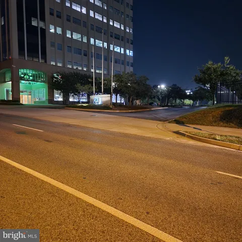 a view of a building with a street