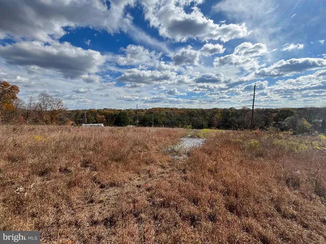 a view of a yard covered with snow
