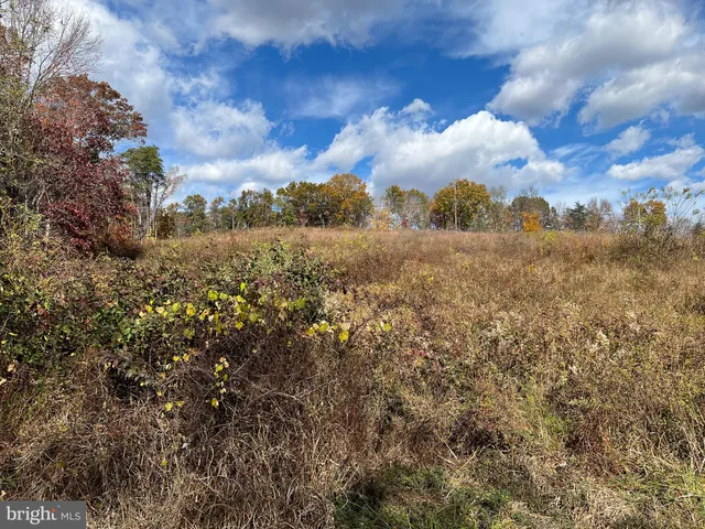 a view of a lake with an ocean