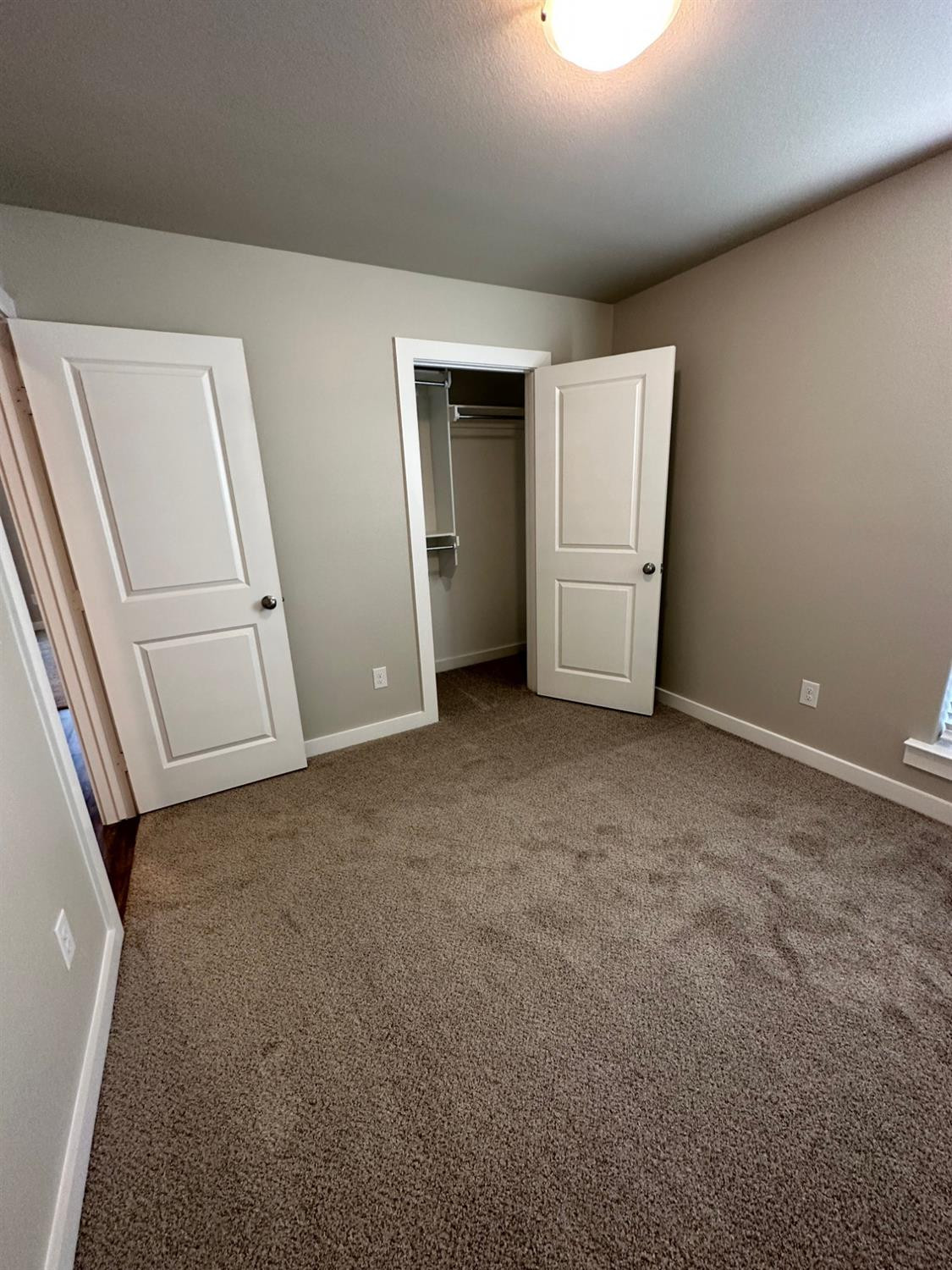1604 135th Street Lubbock, TX 79423 - Photo 11 of 15 an empty room with closet