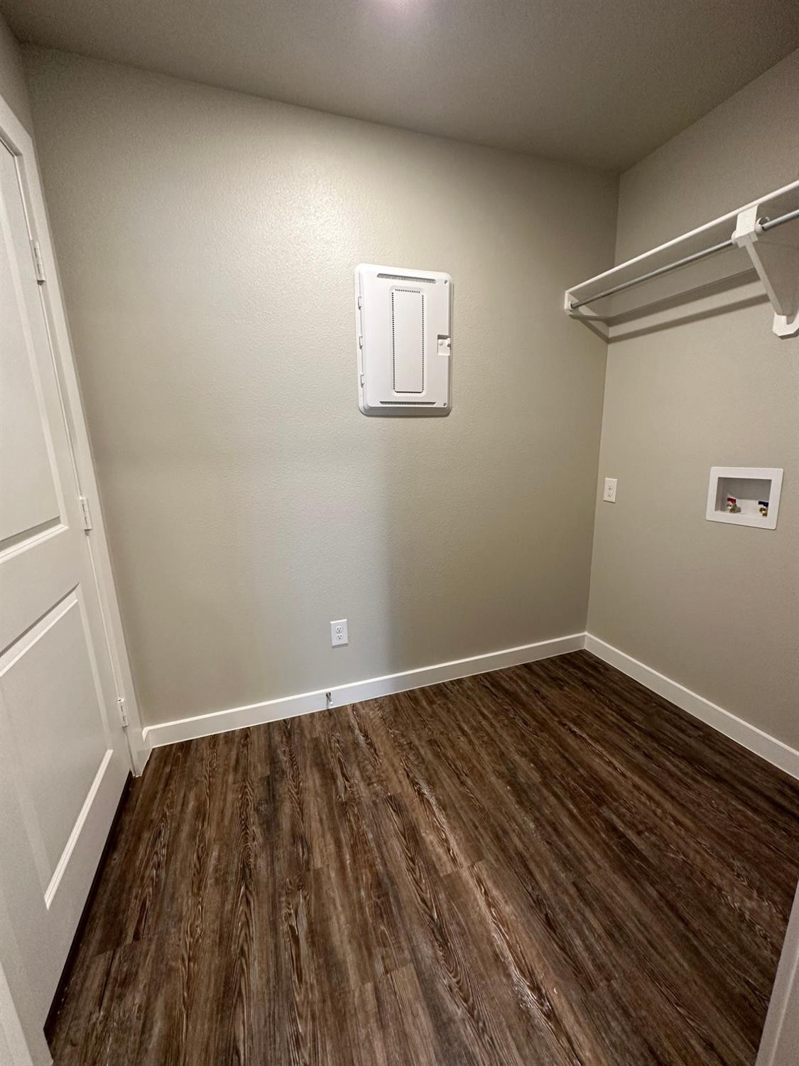 1604 135th Street Lubbock, TX 79423 - Photo 7 of 15 a view of a room with wooden floor and window