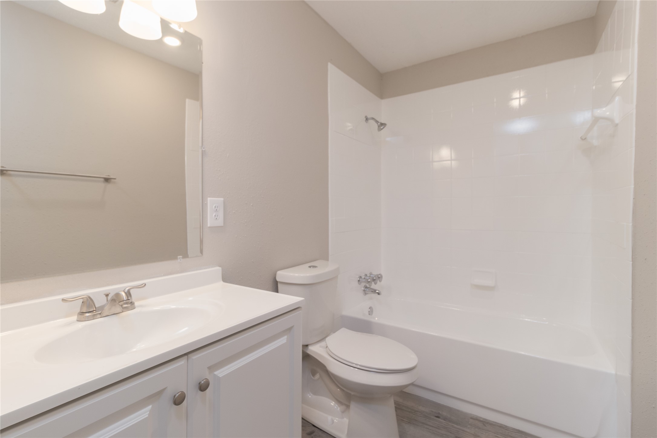 9603 Seeker Street Houston, TX 77078 - Photo 10 of 21 a bathroom with a sink a toilet and shower