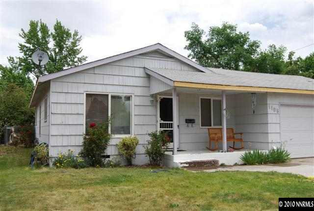 1105 Stewart Street Reno, NV 89502 - Photo 1 of 6 a front view of a house with a yard