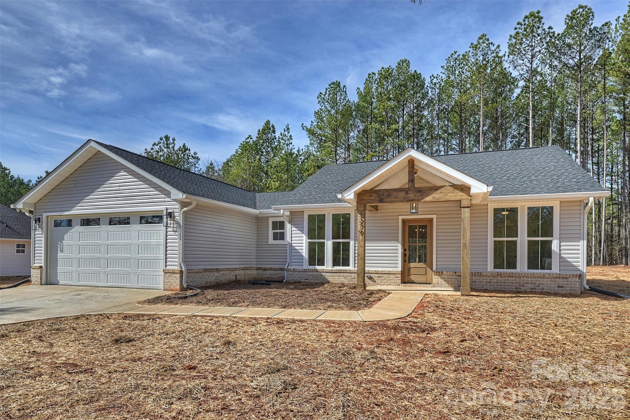 2279 Lee Lawing Road Lincolnton, NC 28092 - Photo 2 of 41 front view of a house with a yard