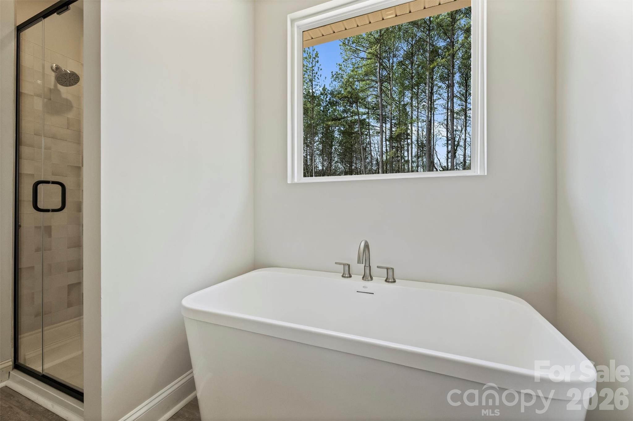 2279 Lee Lawing Road Lincolnton, NC 28092 - Photo 25 of 41 a white bath tub sitting next to a shower