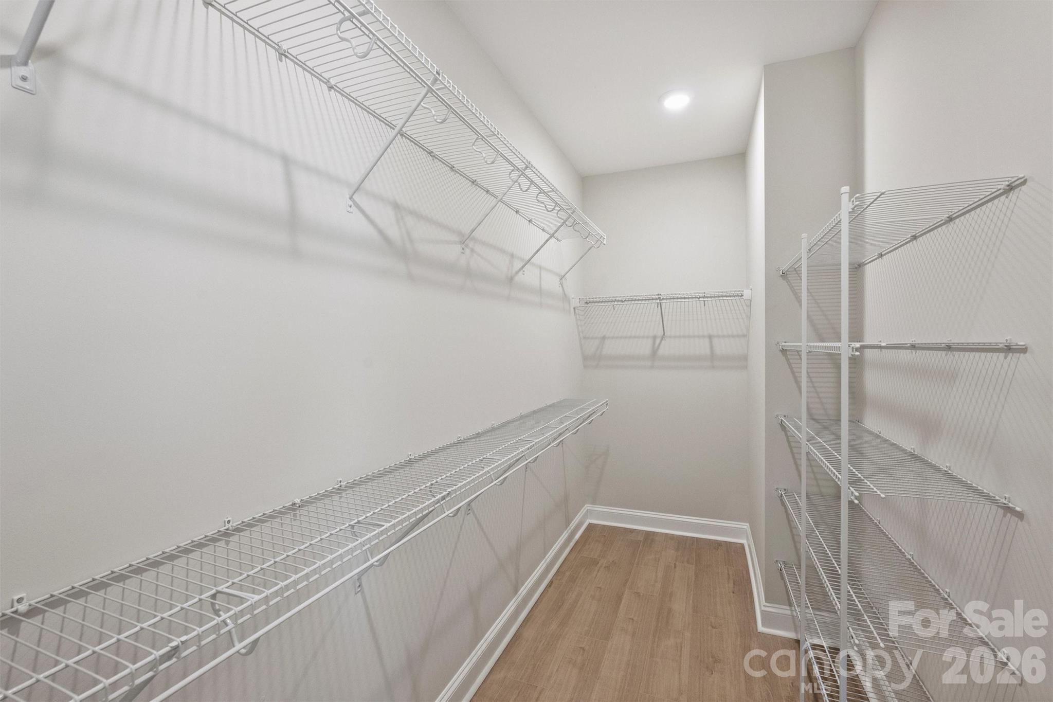 2279 Lee Lawing Road Lincolnton, NC 28092 - Photo 27 of 41 a view of walk in closet with empty racks